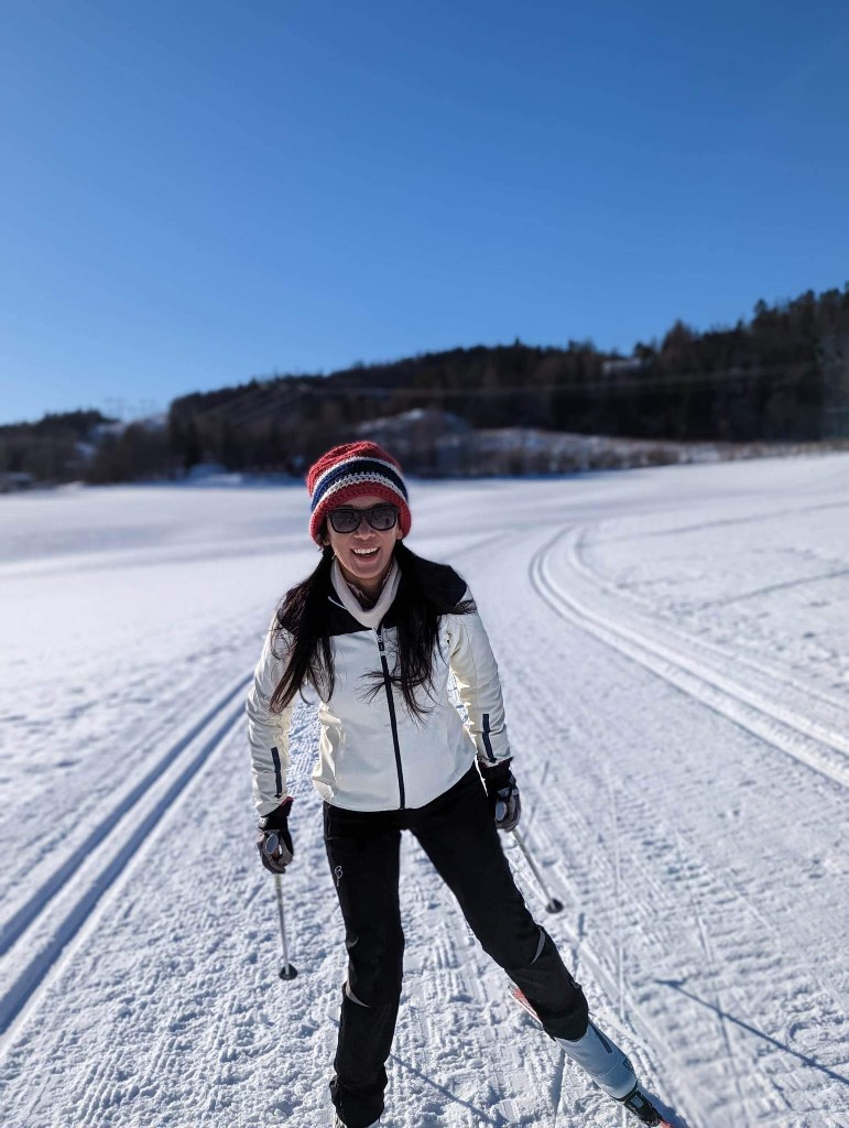 Cross-country skiing on a sunny winter trail